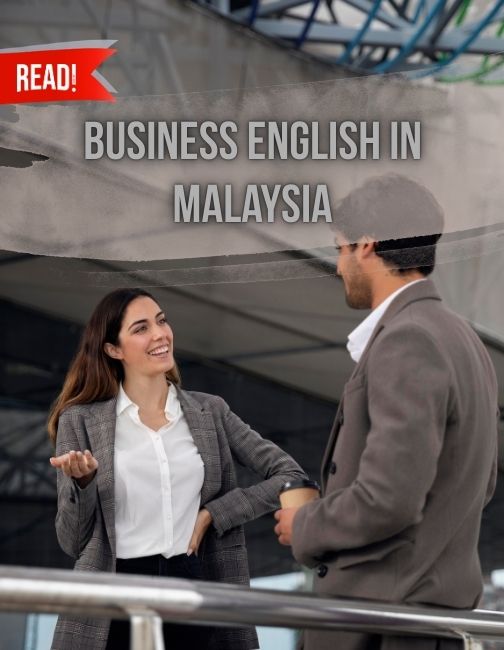 Two office worker communicating happily beside walkway