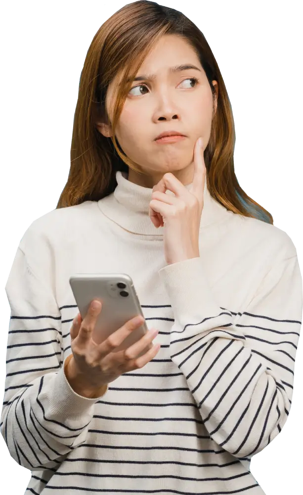 A girl thinking while holding her mobile phone