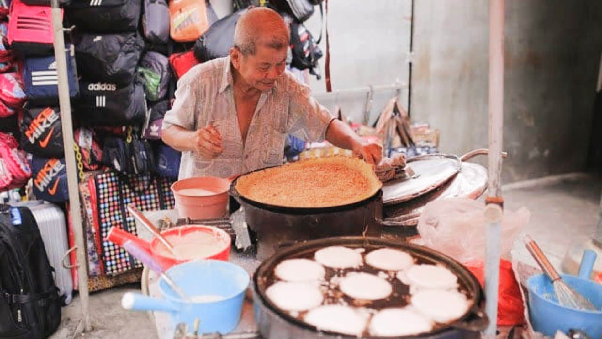 Uncle from petaling street selling Malaysian local dessert Apam Balik.