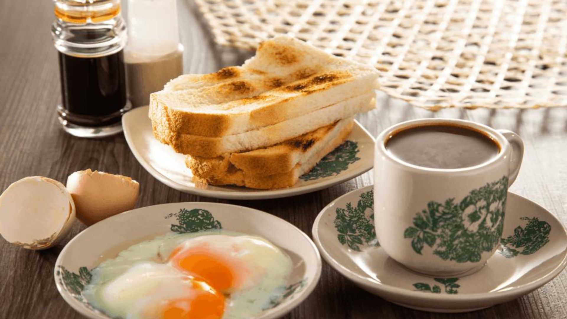 Typical Malaysian Kopitiam breakfast, roti bakar, telur (soft-boiled egg) and kopi