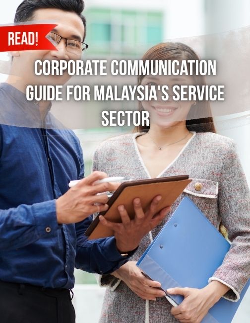Smiling young asian business people discussing document using corporate communications phrases